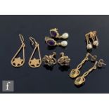 A pair of 14ct amethyst and cultured pearl earrings, weight 3.5g, with two pairs of 9ct earrings,