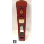 A post 1950s red Chlorophyll vending machine for 6d operation, pull spring dispenser, S/D to glass