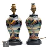 A pair of Moorcroft Pottery table lamp bases decorated in the Western Isles pattern designed by Sian