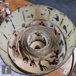A late 19th to early 20th Century 'Wheel of Life' Zoetrope, the black lacquer exterior with