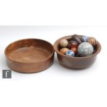 Two post 1950s walnut fruit bowls and carved simulated fruit and a quantity of ceramic coloured