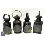 A LMS black painted hand lamp, two BR hand lamps and a black painted square hand lamp. (4)