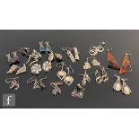 Nineteen pairs of modern silver earrings to include stone set marcasite, onyx and other examples. (