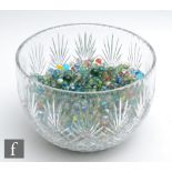 A large collection of various glass marbles, to include swirl, opaque and confetti examples, of