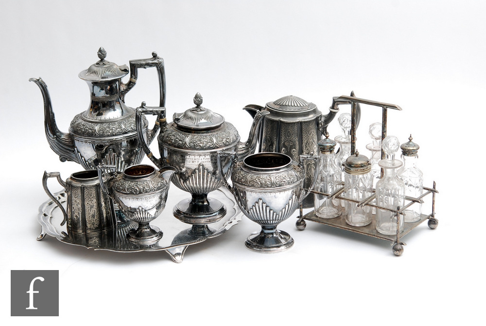 A small parcel lot of assorted silver plated items to include a salver, tea set, six bottle cruet