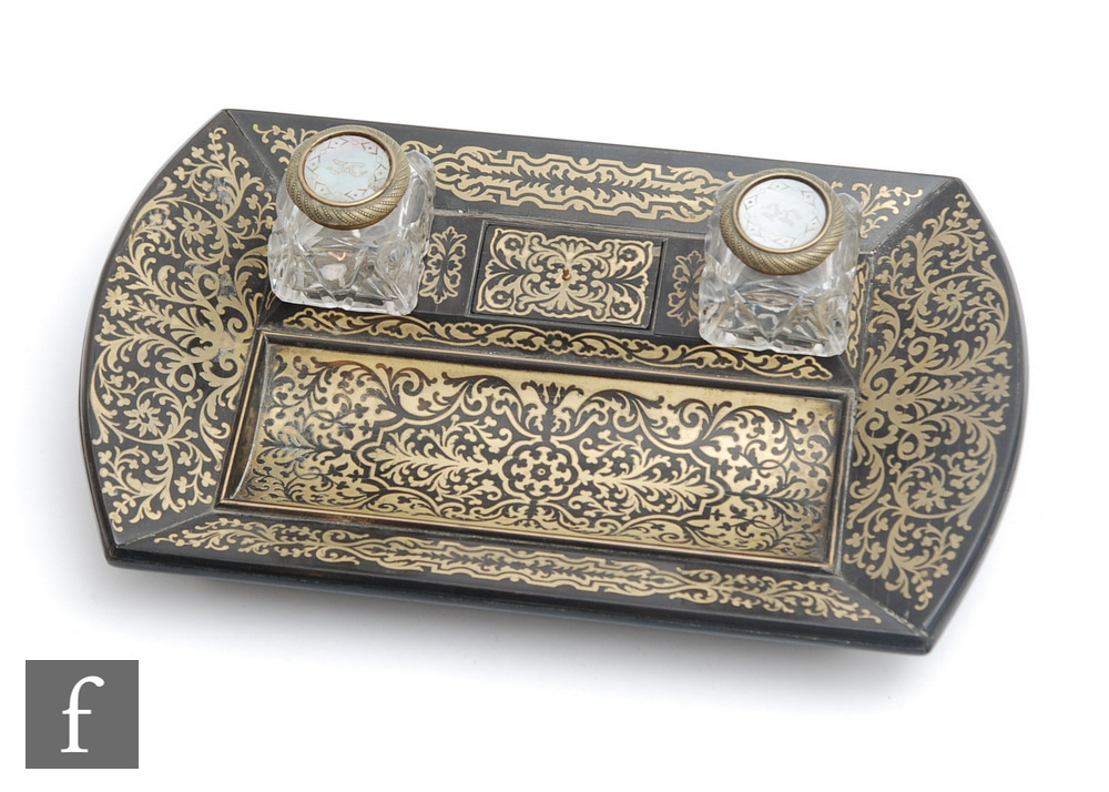 A late 19th Century Boulle work inkwell/desk stand, with brass inlaid scroll and foliate detail,