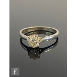 An 18ct white gold diamond solitaire ring, brilliant claw set stones, weight approximately 0.40ct,
