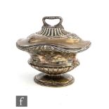 A 19th Century French silver pedestal boat shaped tea caddy with part fluted and floral swag