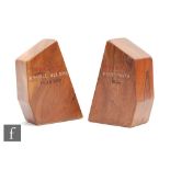 Two shaped yew wood book ends stamped H.M.S Victory Portsmouth 1934 and 'Wood From Admiral Nelsons