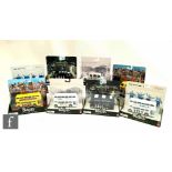 A collection of eight Corgi Beatles Album Cover die-cast vehicles, to include four buses,