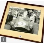 An Aston Martin photograph signed in blue ink by Roy Salvadori of the works at DB3S at Goodwood