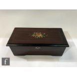 A musical box, serial No 16838, playing six airs, printed tune card, simulated rosewood case with