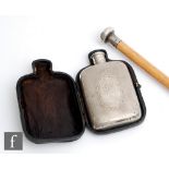 A Victorian gentleman’s engine turned silver hip flask, Birmingham 1872, in leather case,