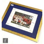 A facsimile signed photograph of the England World Cup Rugby winners 2003 team in celebration 45.5cm