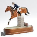 A boxed limited edition Royal Worcester equestrian study modelled by Doris Lindner titled Stroller