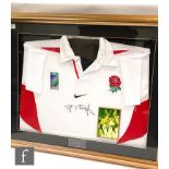 A framed 2003 England Rugby World Cup shirt signed by Jonny Wilkinson, with insert photograph,
