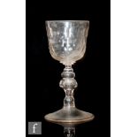 An 18th Century Silesian goblet circa 1740, with a facet cut bowl above a multi knopped stem with