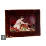 A late 19th Century hand painted KPM type porcelain plaque with a scene of a partially undressed