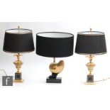 A collection of gilt metal table lamps, to include a pair of classical urn form examples, raised