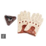 A pair of MG leather driving gloves and a brown Bakelite ashtray with fixed pen holder. (2)