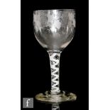 An 18th Century goblet circa 1775, the cup bowl engraved with fruiting vine border with polished
