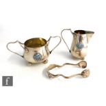An Art Nouveau hallmarked silver strawberry set comprising cream jug, height 8cm, and twin handled