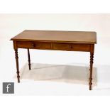 A late 19th to early 20th Century mahogany side table, fitted with two frieze drawers above turned