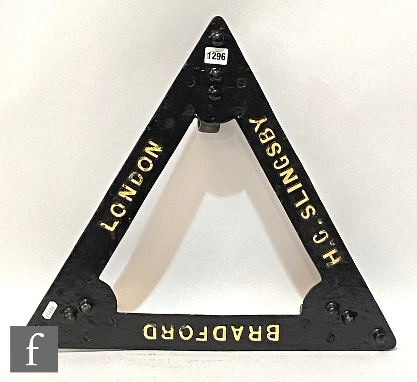 A London & Bradford H.G.Slingsby cast iron black painted triangular plate converted to a wheeled