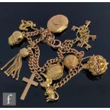 A 9ct rose gold uniform curb link Albert chain converted to a charm bracelet with various charms