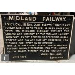 A cast iron Midland Railway sign for license and consent to travel and pass, dated June 1893, 71cm x