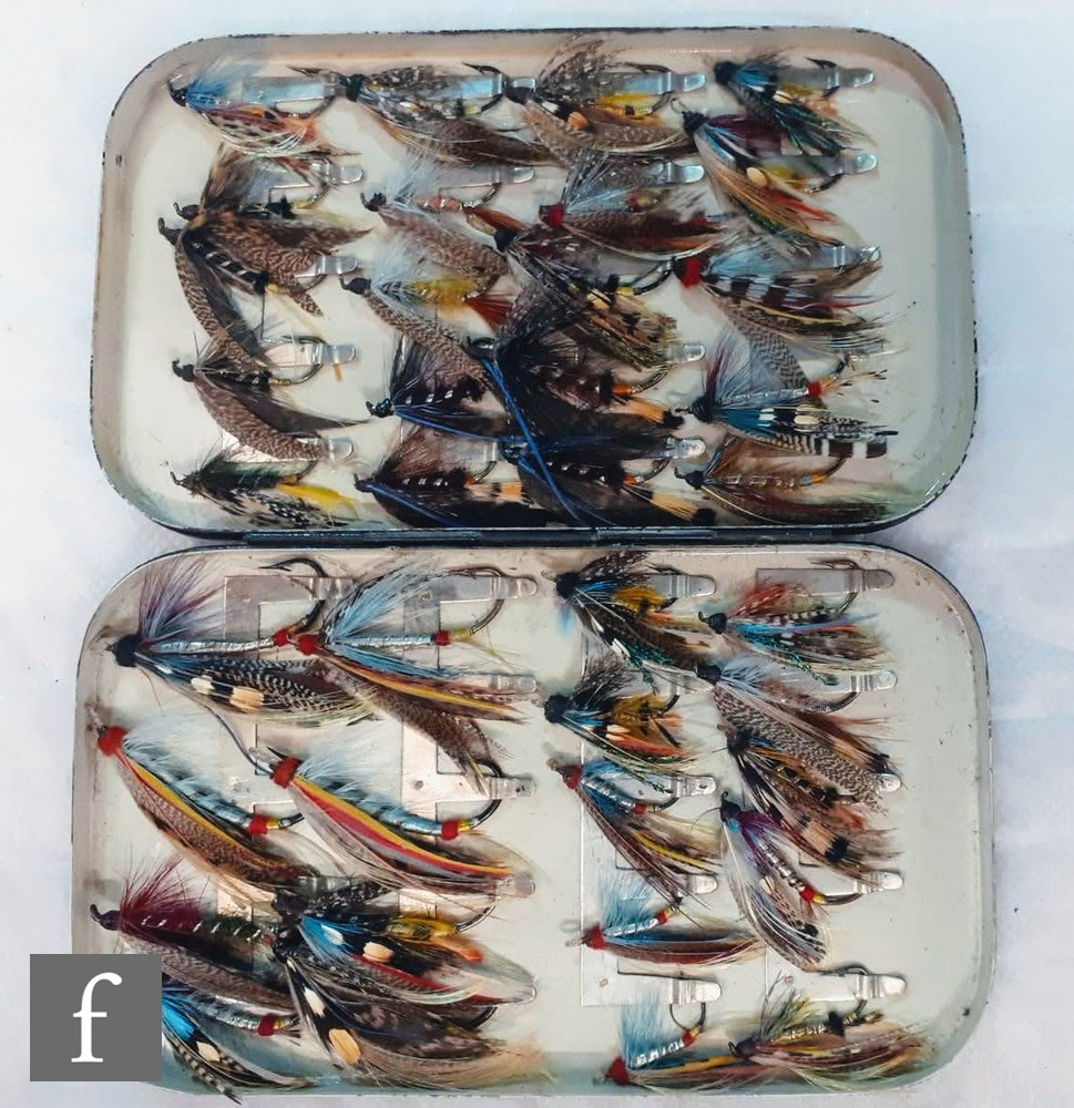 A Malloch's japanned metal hinged lid fly tin containing a collection of approximately forty