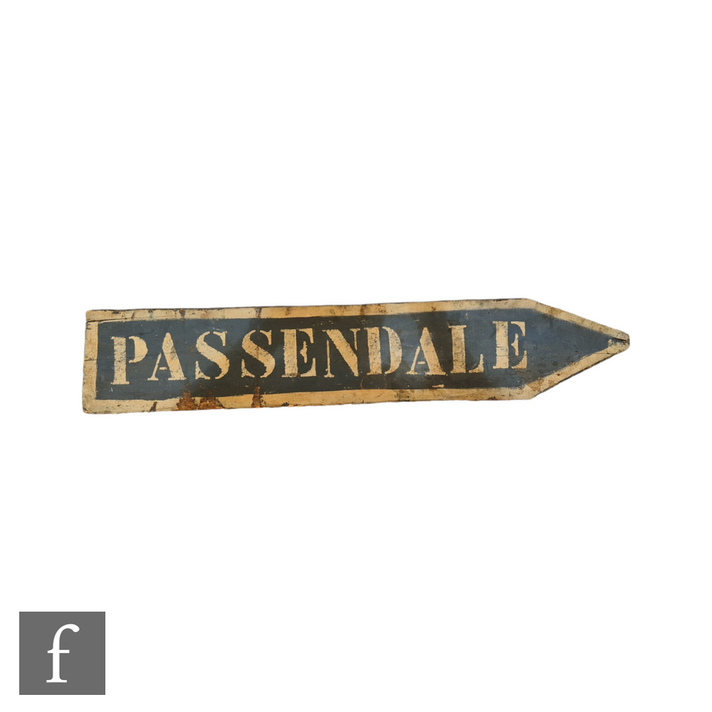 A printed wooden Passendale [sic] sign in arrow directional shape, white on slate blue, bears