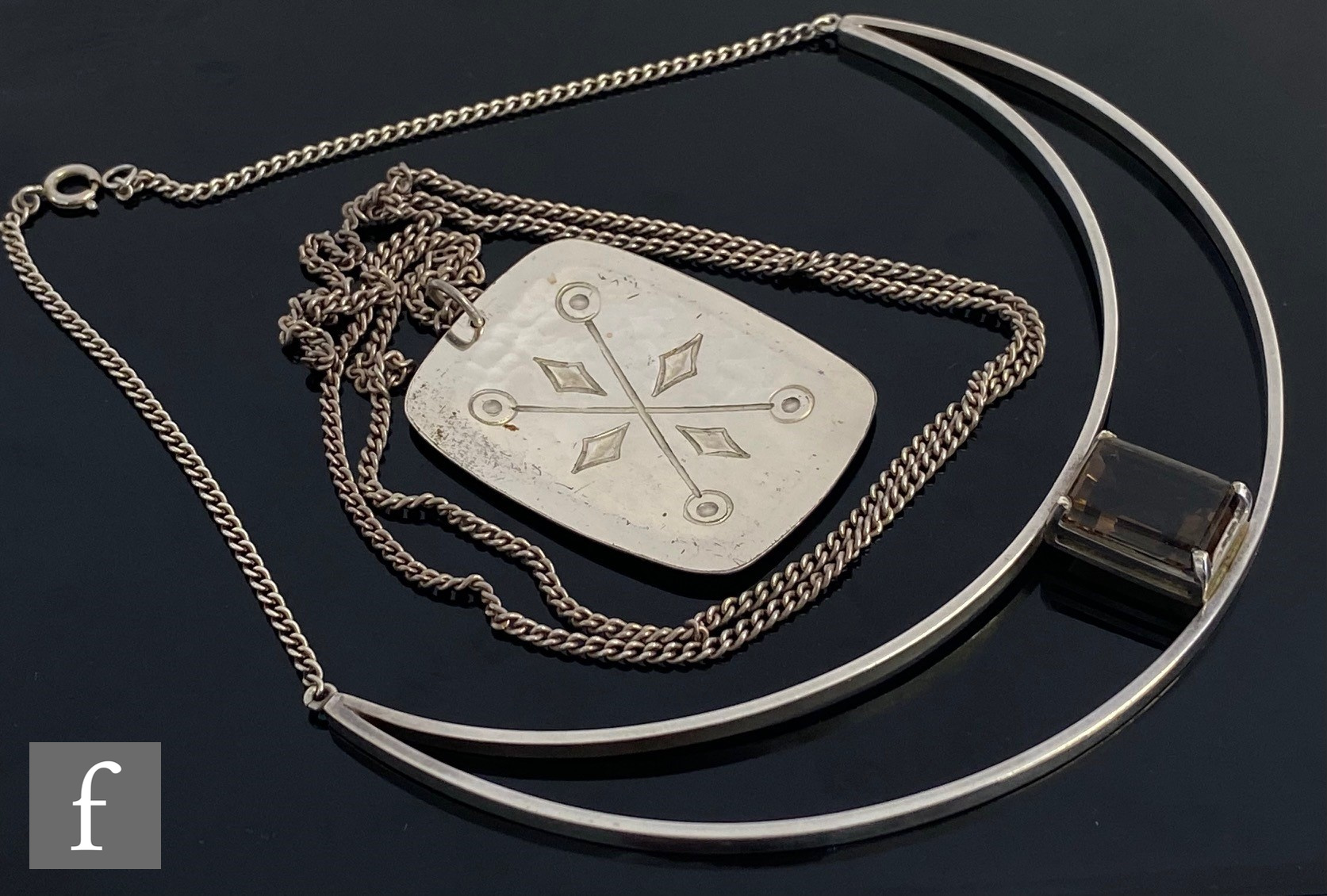 A hallmarked silver cushioned rectangular pendant length 5cm, suspended from a white metal chain