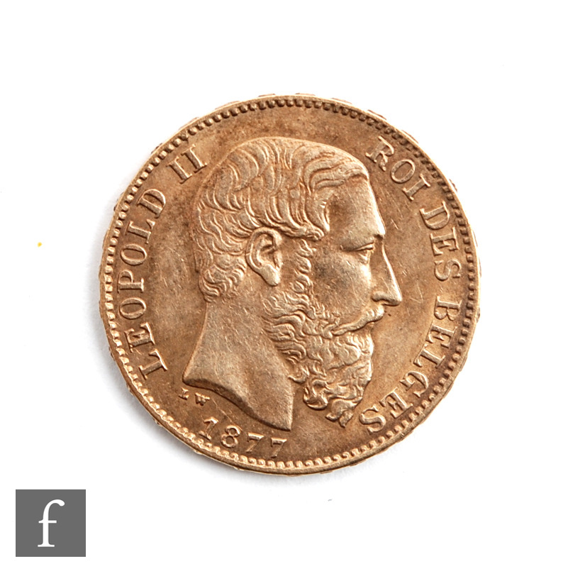 A Leopard II twenty Francs 1877.