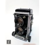 A late 1950s/early 60s Mamiya C33 Professional TLR Camera Body, serial number H348404, fitted with