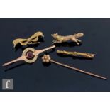 Four assorted 9ct brooches to include one modelled as a fox, with a diamond and seed pearl set stick