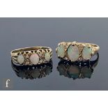 Two later 20th Century opal and diamond seven stone rings each in the Victorian style, total