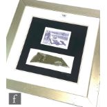 A small piece of aluminium from 'Bluebird', together with a facsimile photograph of Donald