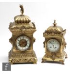 An Edwardian brass cased mantle clock with eight day striking movement, circular Arabic dial, the