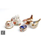 Five boxed Royal Crown Derby paperweights comprising Meadow Rabbit, Millennium Bug, Piglet, Derby