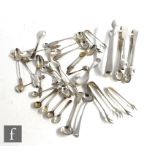 A parcel lot of assorted hallmarked silver flat ware to include a set of six apostle tea spoons, a
