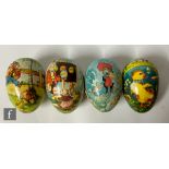 Four German card Easter eggs with lacquered decoration of rabbits and chickens, largest 11.5cm.