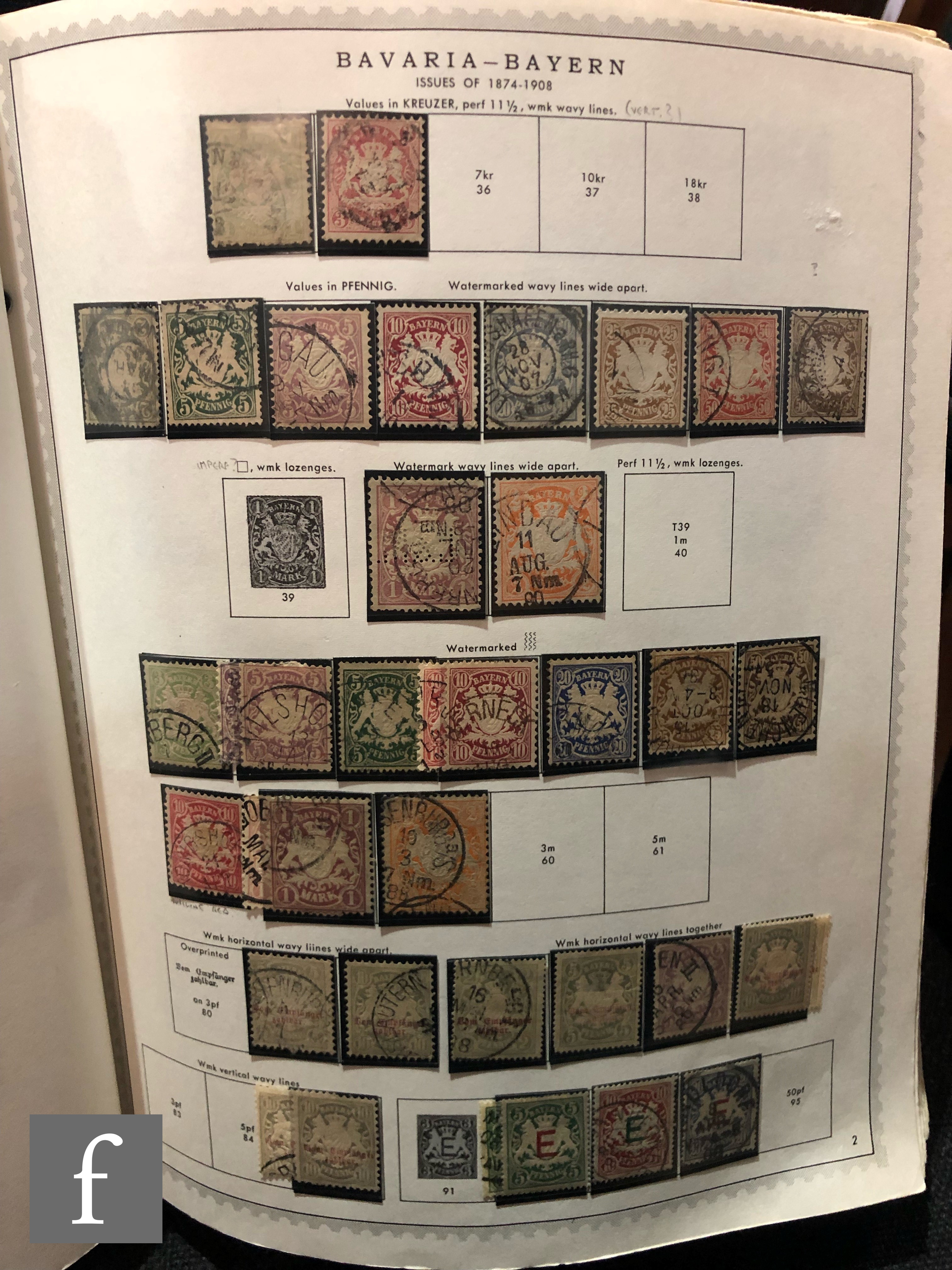 A collection of German postage stamps dating from 1851 to the mid 1970s, in a large blue album.