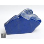 A large block of natural veined polished Lapiz Lazuli, length 28.5cm.