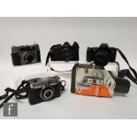 A small group of cameras to include Cosina Computer CT7 SLR camera, with Pentax -M 1:1.7 50mm