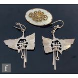 A pair of Norwegian silver abstract drop earrings stamped Juhls with a similar enamel decorated