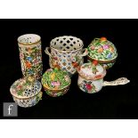 Four pieces of assorted Herend comprising two globular trinket boxes, both S/D, a pierced cylinder
