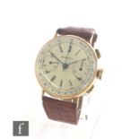 A gentleman's mid 20th Century 18ct IPI watch Co chronograph wrist watch with Roman numerals and