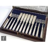 A cased set of six hallmarked silver fish knives and forks with reeded silver handles, silver blades