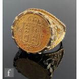 A 9ct hallmarked half sovereign ring set with a Victoria coin dated 1887, to pierced shoulders,